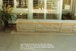 Light Sand Wash Finish Concrete with Davis Integral  Color  Omaha Tan with 8 Wide Smooth Trowel Finish Band   18 Seatwall with Arizona Flagstone Ledge stone Face and Matching Cap.