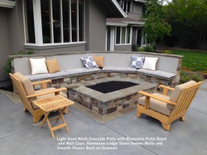 Light Sand Wash Concrete Patio with Bluestone Patio Band and Wall Caps. Kennesaw Ledge Stone Veneer Walls and Smooth Stucco Back on Seatwall