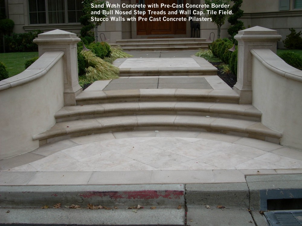 Sand Wash Concrete with Pre-Cast Concrete Border and Bull Nosed Step Treads  and Wall Cap. Tile Field. Stucco Walls wth Pre Cast Concrete Pilasters -  Jeffwortham