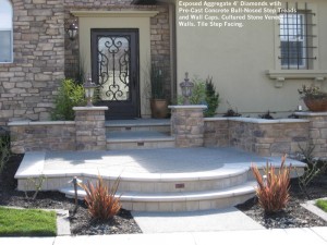 Exposed Aggregate 4’ Diamonds wtih Pre-Cast Concrete Bull-Nosed Step Treads  and Wall Caps. Cultured Stone Veneer  Walls. Tile Step Facing. 