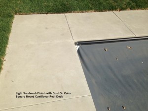 Light-Sandwash-Finish-with-Dust-On-Color-Square-Nosed-Cantilever-Pool-Deck   