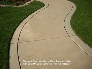 Stamped Concrete with a Slate Seamless Skin  with Dust On Color. Smooth Trowel 8” Border  