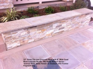 12” Stone Tile over Concrete Base with 8” Wide Sand Wash Concrete Border. MG Home Modern Series - ‘Sunrise Gold’ Stone Veneer on Seatwall with Frontier Flagstone Cap.