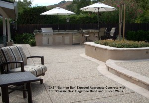 2” ‘Salmon Bay’ Exposed Aggregate Concrete with 10” ‘Classic Oak’ Flagstone Band and Stucco Walls
