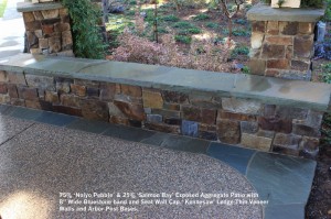 75% ‘Noiyo Pebble’ & 25% ‘Salmon Bay’ Exposed Aggregate Patio with 8” Wide Bluestone band and Seat Wall Cap.‘ Kennesaw’ Ledge Thin Veneer Walls and Arbor Post Bases.
