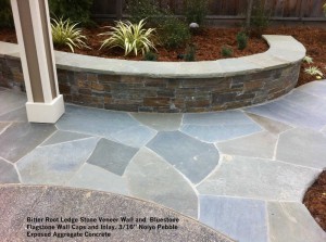 Bitter-Root-Ledge-Stone-Veneer-Wall-and-Bluestone-Flagstone-Wall-Caps-and-Inlay-Noiyo-Pebble-Exposed-Aggregate-Concrete 