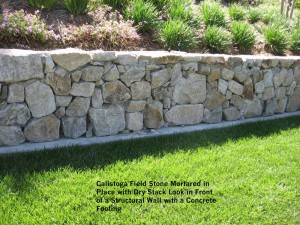 Calistoga-Field-Stone-Mortared-in-Place-with-Dry-Stack-Look-in-Front-of-a-Structural-Wall-with-a-Concrete-Footing 