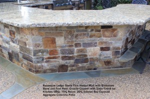 Kennesaw Ledge Stone Thin Veneer Wall with Bluestone  Band and Foot Rest. Granite Counter with Satin Finish for Kitchen_BBQ. 75% Noiyo- 25% Salmon Bay Exposed  Aggregate Concrete Patio