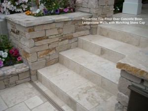 Travertine-Tile-Floor-Over-Concrete-Base-Ledgestone-Walls-with-Matching-Stone-Cap    